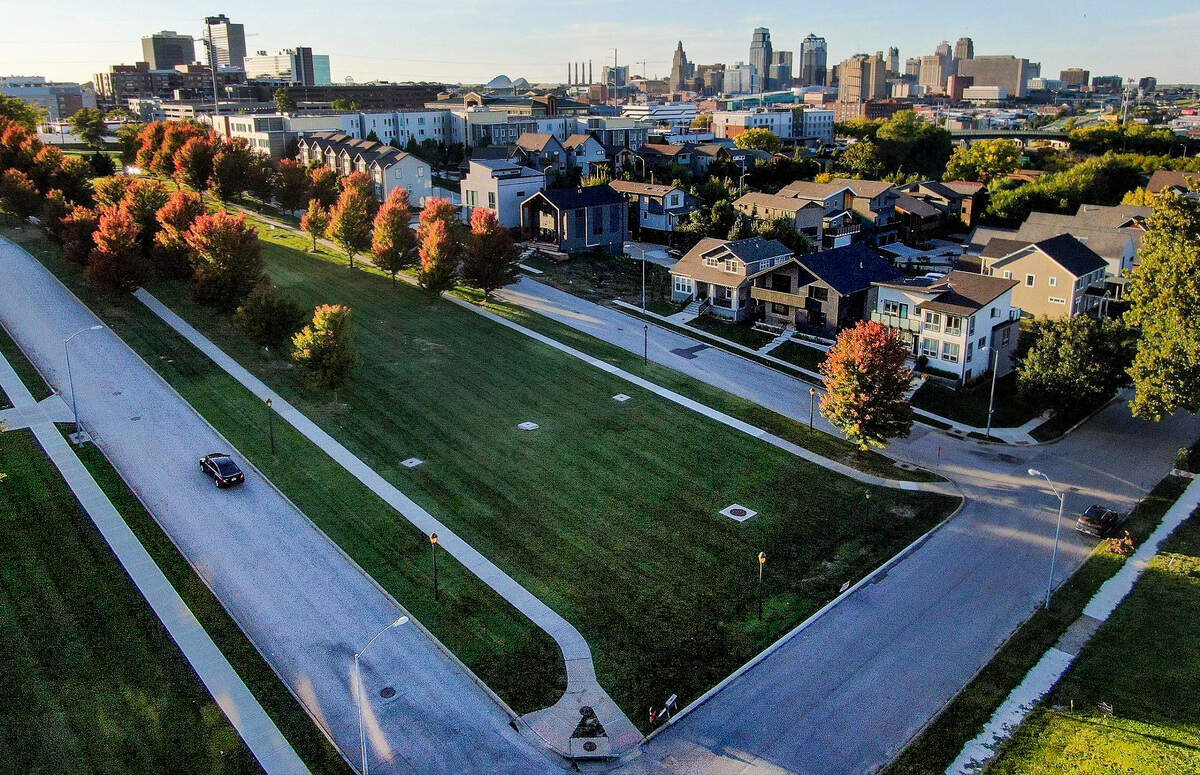 Kansas City is proposing giving $115,000 to the Beacon Hill Homeowners Association, which plans to build a privately managed playground in the green space along this road.