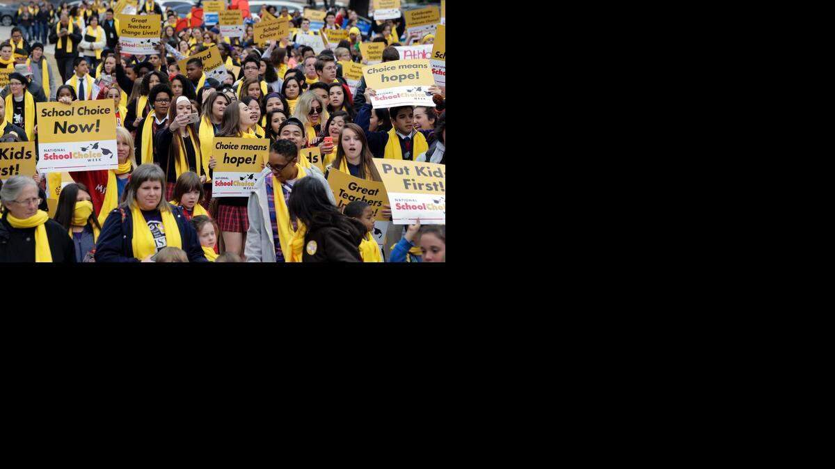 Students, teachers and supporters march on the grounds of the Texas Capitol on Jan. 30, 2015, in Austin, Texas. School choice supporters called for expanding voucher programs and charter schools statewide.