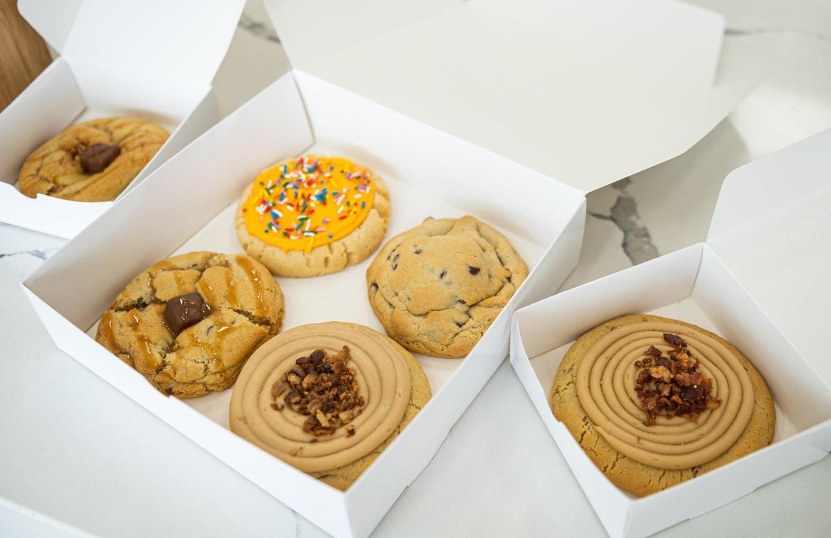 A spread of cookies lays out on the counter of Cookie Co. on June 14, 2023, in Overland Park. Cookie Co. was founded by former Kansas City Chiefs offensive lineman Jordan Devey in May of 2023.