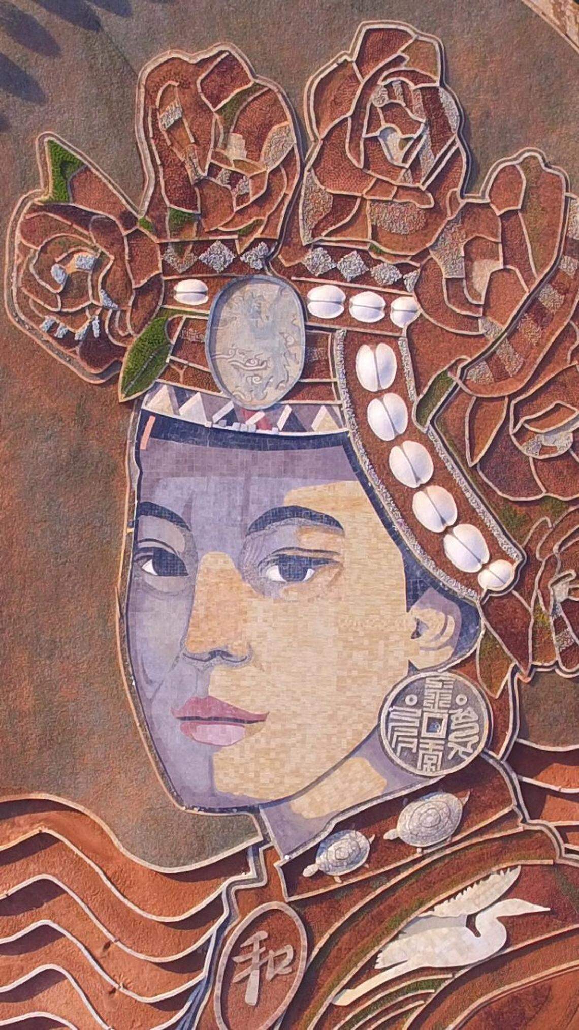 Crop artist Stan Herd's China project represents the most ambitious addition to the cultural environment series of young indigenous women that the Kansas native launched in the early ’90s.