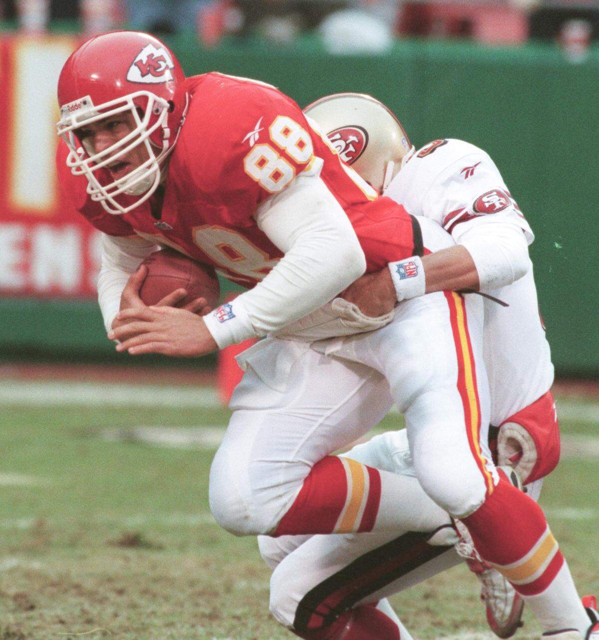 After he blocked a punt in the second quarter, Chiefs rookie tight end Tony Gonzalez was tackled by San Francisco 49ers punter Tommy Thompson on Nov. 30, 1997, at Arrowhead Stadium.