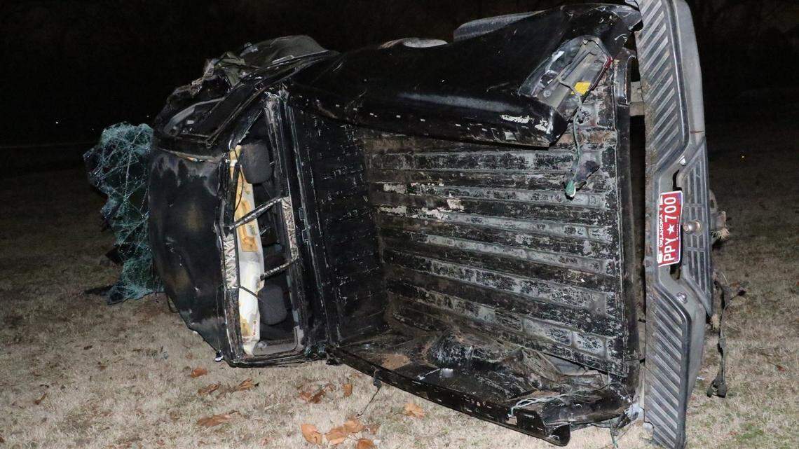 A woman was killed when her husband drove drunk and crashed into a curb, Oklahoma police said.