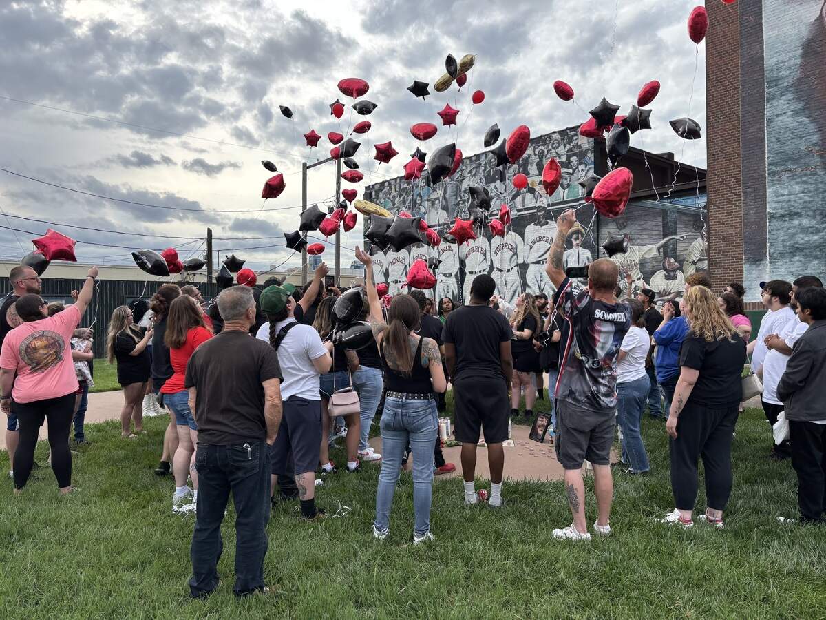 Loved ones release balloons at a memorial vigil for 29-year-old David Eugene Beck III on June 23, 2026. Beck was fatally shot near 18th and Vine Streets on June 19, 2026..