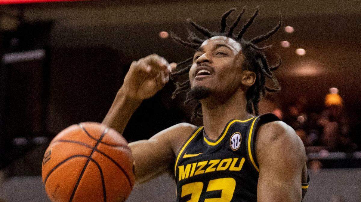 Missouri’s Aidan Shaw celebrates a dunk during the second half of a game against Alabama Saturday, Jan. 21, 2023, in Columbia, Mo.
