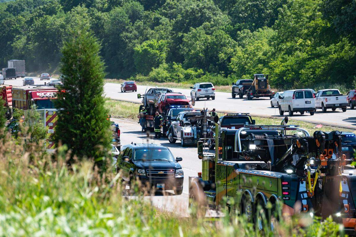 Crews work to clear the wreckage on southbound Interstate 435 after a crash was reported at about 8:30 a.m. Tuesday in Kansas City.