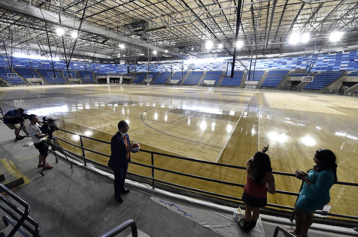 City Councilman Scott Taylor (center) took the media on a tour of the Hy-Vee Arena, formerly Kemper Arena, which is under construction and scheduled to open in the fall.