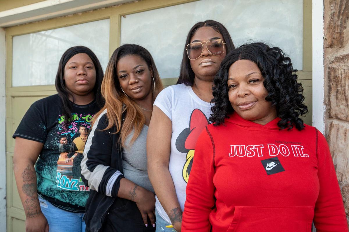 The family of Tyrea Pryor, who was fatally shot by Independence police on Friday, March 4, 2022, gathered to talk about Pryor. The family includes niece Taylor Bozeman, from left, Ebony Findley, mother of Tyrea Pryor’s two children, and Tyrea Pryor’s two sisters Cyrstal Leggs and Marchelle Pryor at Leggs’ home in Kansas City on Tuesday, March 15, 2022. Pryor was fatally shot last Friday by Independence police officers when they saw him display an AR-style rifle following a police pursuit and crash, the Missouri State Highway Patrol said.