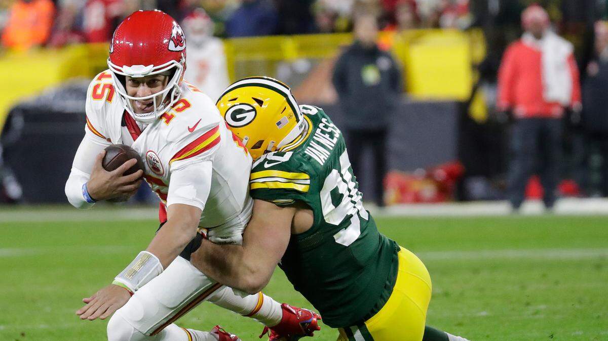 Rookie Packers linebacker Lukas Van Ness brings down Chiefs quarterback Patrick Mahomes for his second NFL sack during Sunday night’s game at Lambeau Field.