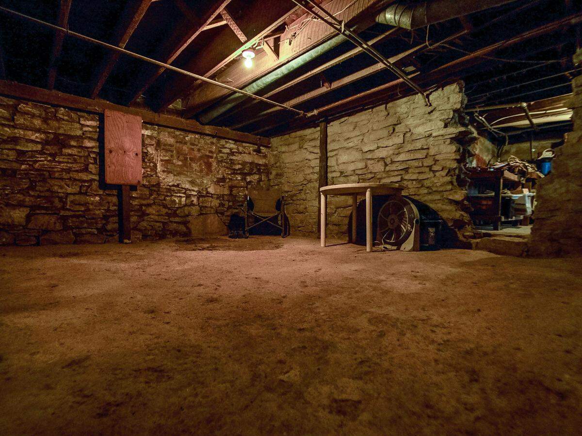 The creepy basement of the haunted Dilgert house in Atchison, Kan., dubbed the “House of Too Many Ghosts” by HGTV.