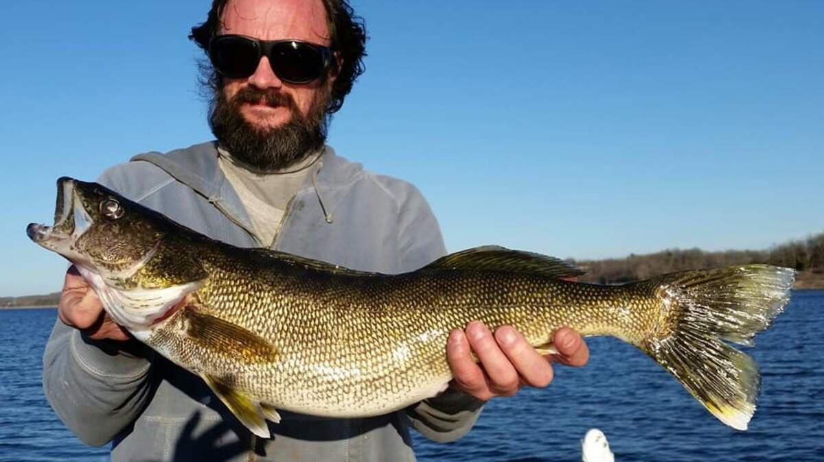 Guide Del Colvin and his client, Scott (pictured), had a heck of a morning on Bull Shoals recently. Scott traveled down from Wisconsin to fish for bass and wound up catching a giant 7-pound walleye.