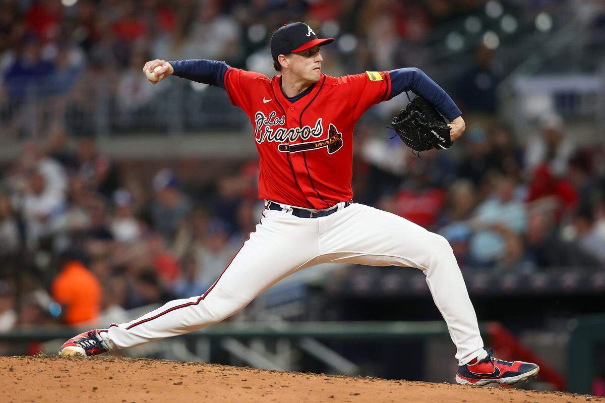 Atlanta Braves relief pitcher Kyle Wright (30) throws against the Chicago Cubs in the sixth inning at Truist Park on Sept. 28, 2023.