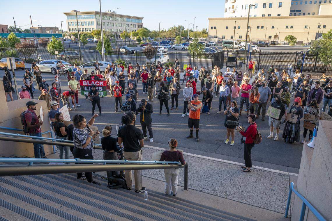 Albuquerque community members gather, Monday, Oct. 6, 2025, in front of the John A. Price Law Enforcement Center in Albuquerque for a press conference for Jayvon Givan.