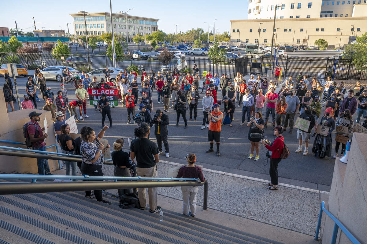Albuquerque community members gather, Monday, Oct. 6, 2025, in front of the John A. Price Law Enforcement Center in Albuquerque for a press conference for Jayvon Givan.