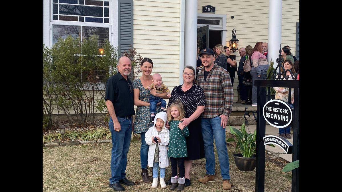 Cynthia Samsel, second from right, and her husband Kevin, left, moved the Kansas City are to be closer to their children and grandchildren. They moved to Lee’s Summit and bought the Historic Browning last year. Chef Cynthia got to work creating a charming bed & breakfast and a lovely event space. Her husband helps take care of the historic building.