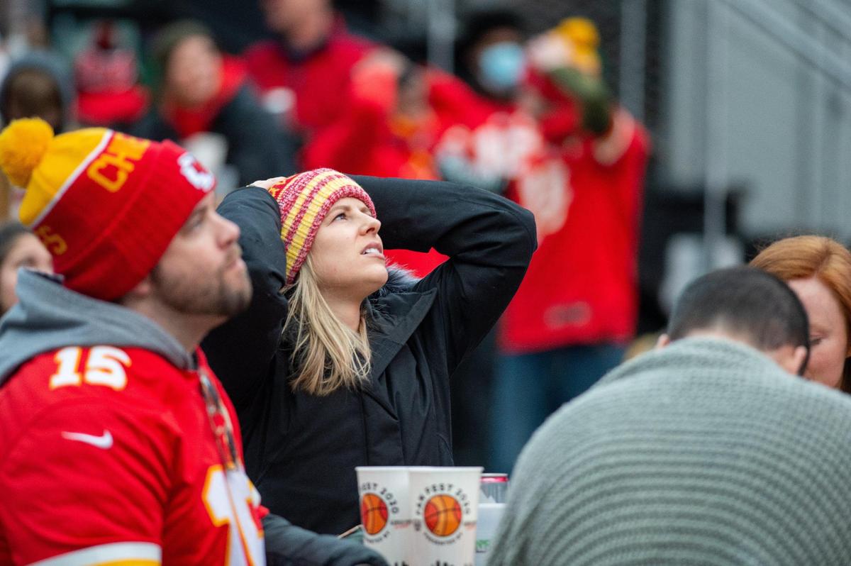 A Chiefs fan reacts after backup quarterback Chad Henne threw an interception in the end zone in the fourth quarter of the game against the Cleveland Browns Sunday, Jan. 17, 2021.