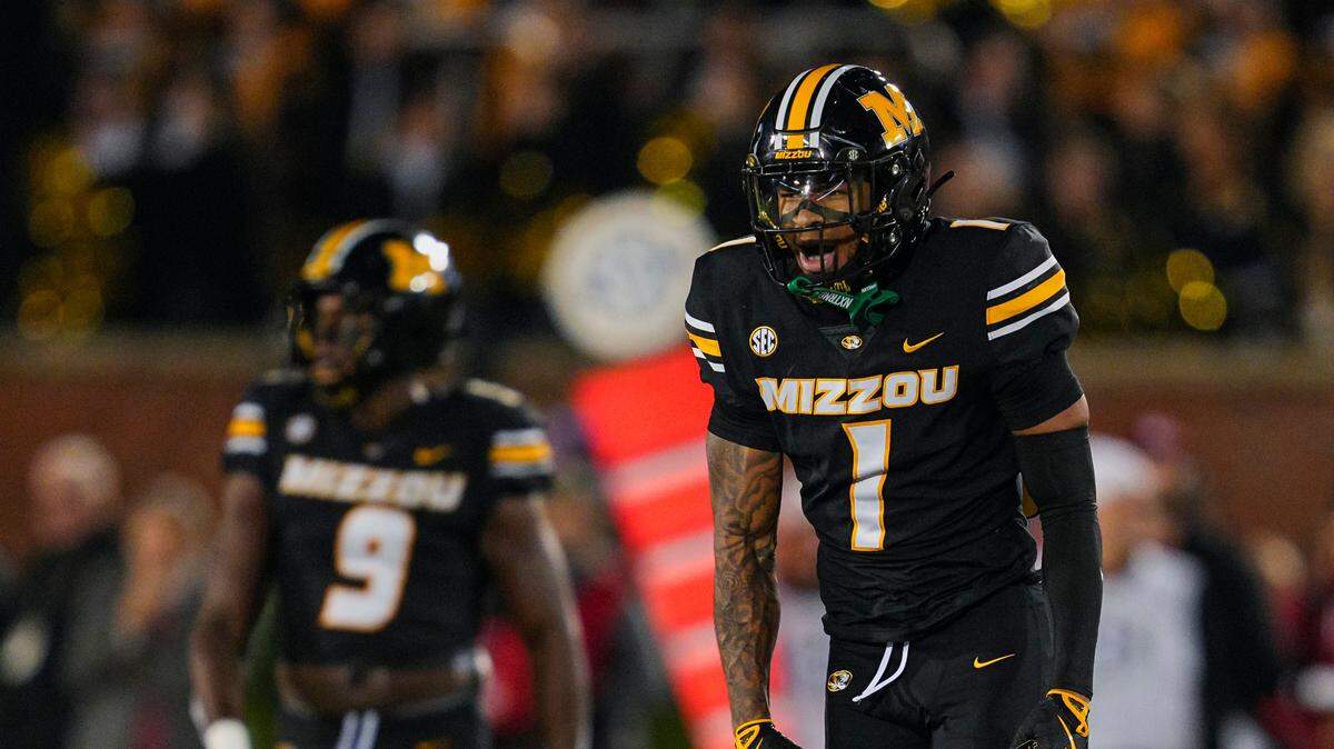 Missouri Tigers safety Marvin Burks Jr. (1) celebrates after a fumble recovery during the second half against the Oklahoma Sooners at Faurot Field at Memorial Stadium on Nov. 9, 2024.