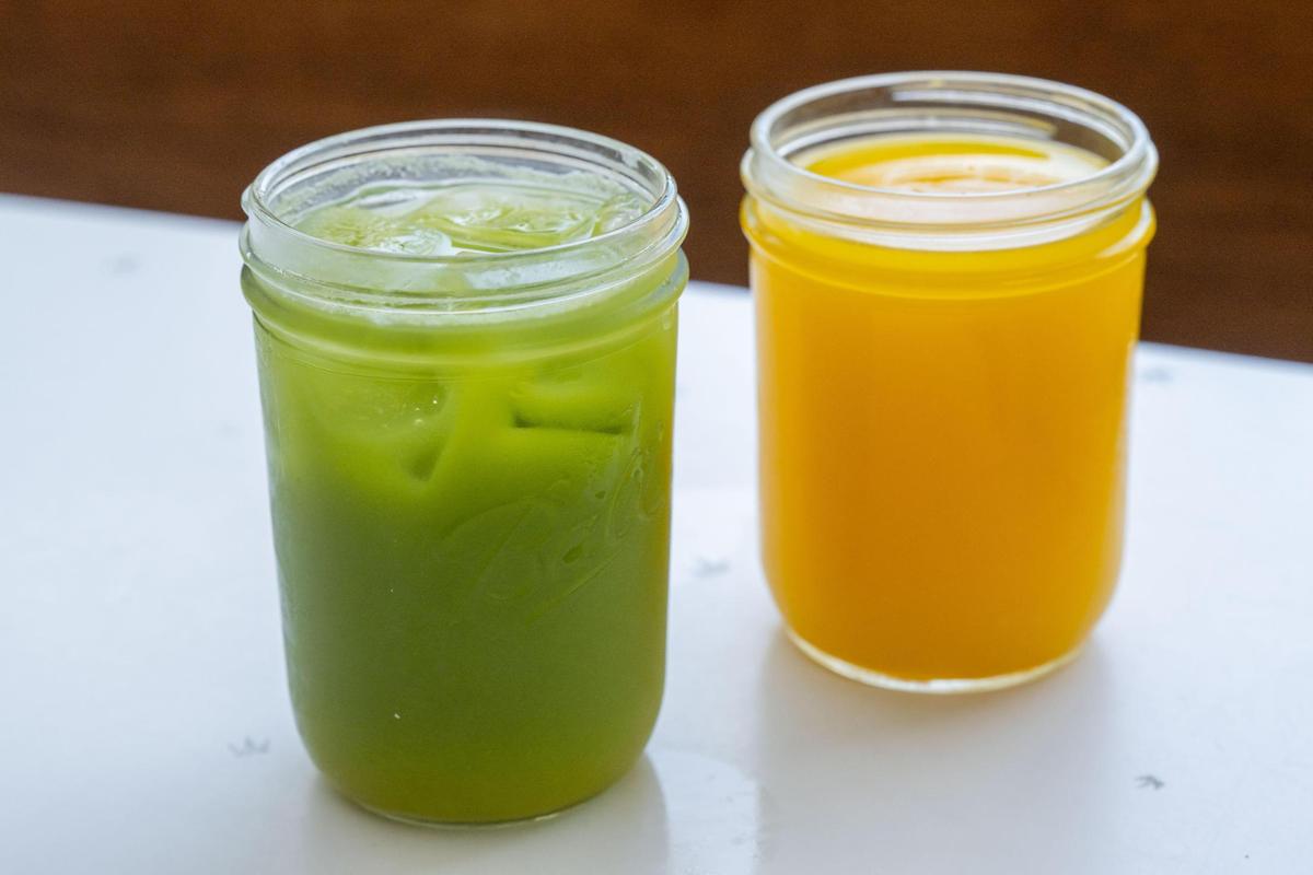 Fresh juices such as the Mr. Green Jeans and their orange juice, are a staple at Succotash in Kansas City, seen here on June 16.