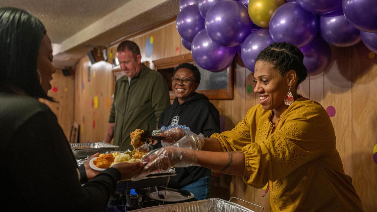 Tamika Pouncil, with Taste of Soul Catering, volunteered alongside other local catering services to feed the community last Wednesday in the spirit of Thanksgiving at 24 Hour Faith Training Center.
