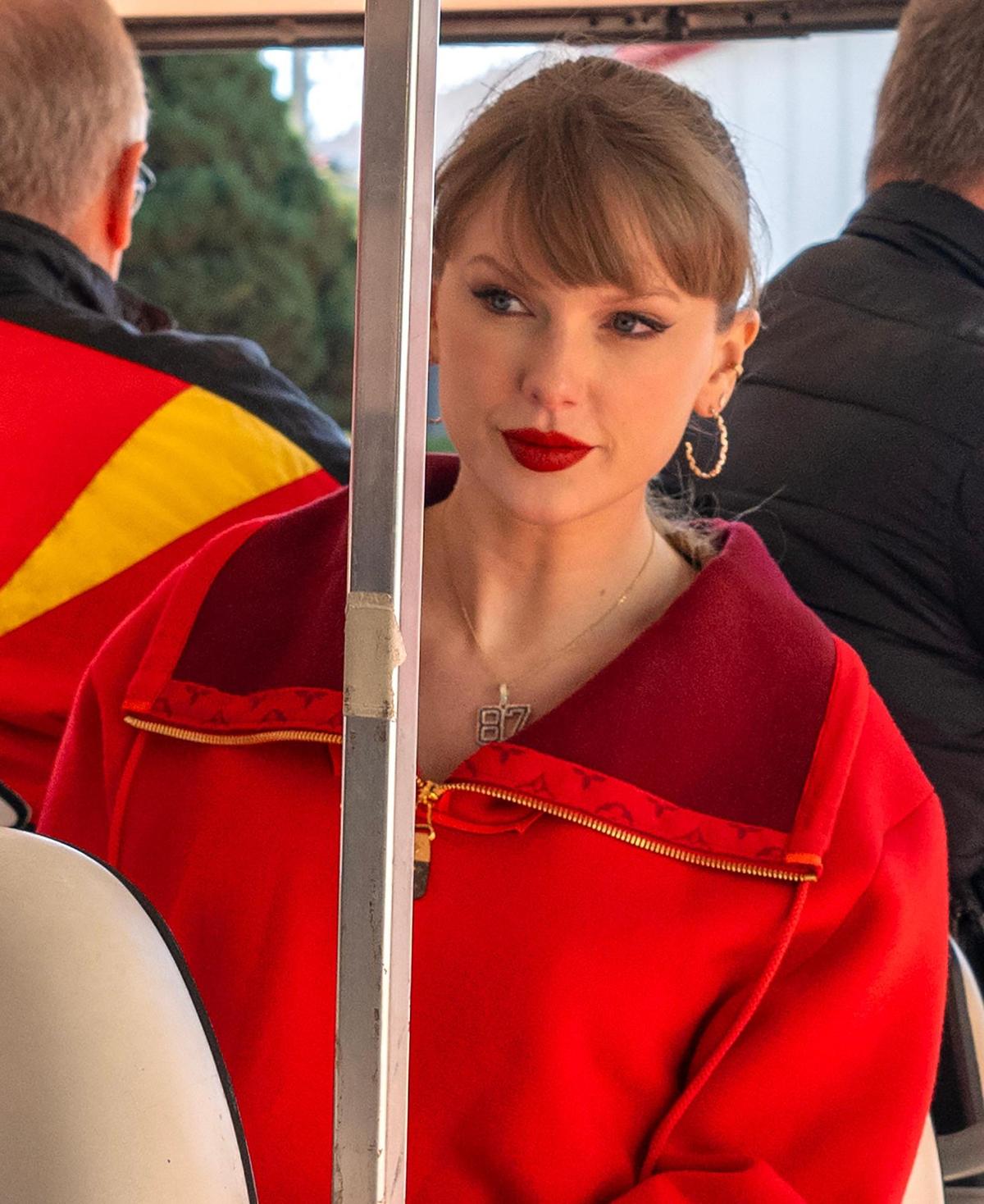 Pop star Taylor Swift is driven through a tunnel on a golf cart to attend an NFL game between the Kansas City and the Las Vegas Raiders on Friday, Nov. 29, 2024, at GEHA Field at Arrowhead Stadium.