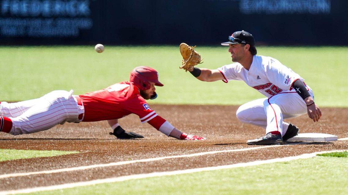 Louisiana’s Carson Roccaforte, right, attempts a putout during a March 2022 game against Houston.