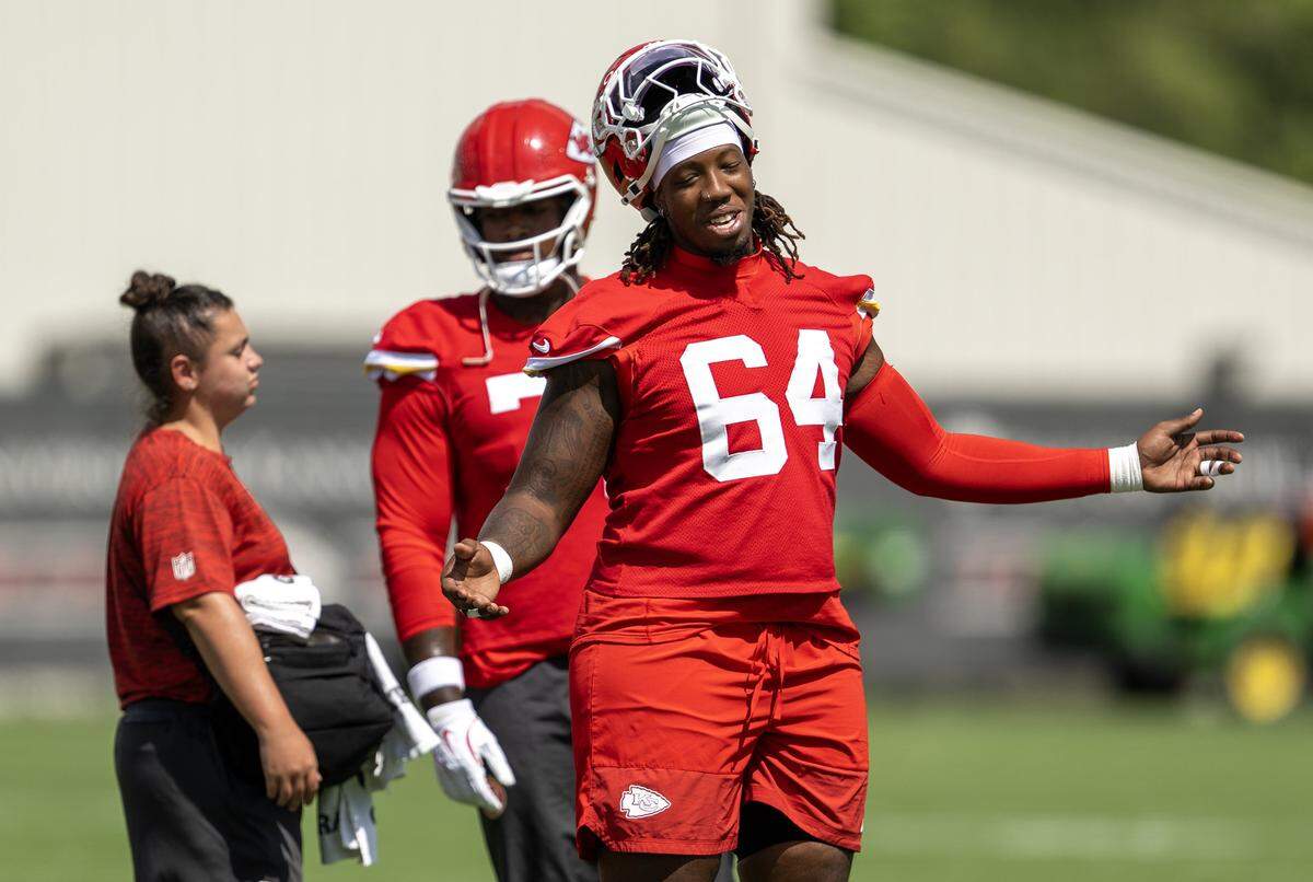 Kansas City Chiefs offensive tackle Wanya Morris (64) warms up at practice at team's training facility on Wednesday, August 20, 2025. in Kansas City
