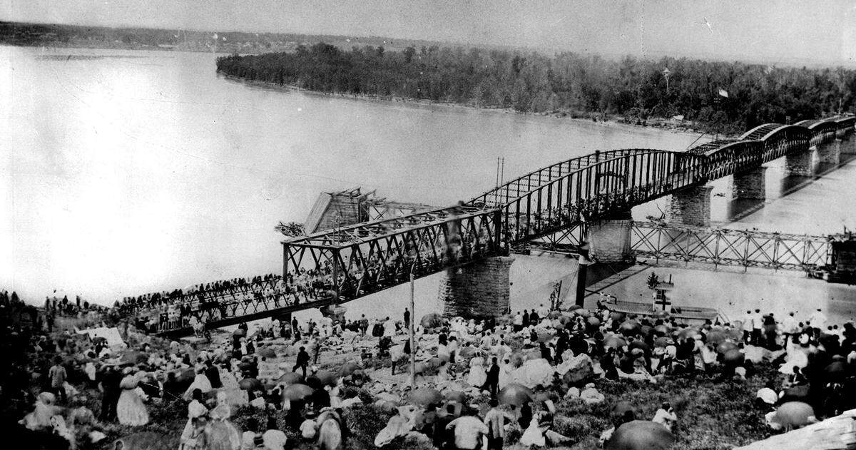 Kansas City’s future as a rail center was assured by the construction of the first bridge across the Missouri River on July 3, 1869, when this photograph was made. More than 30,000 persons turned out to celebrate the public opening of the span.&nbsp;