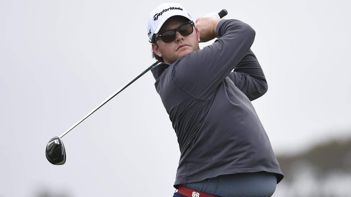 Harry Higgs hits his tee shot on the fifth hole of the South Course at Torrey Pines Golf Course during the final round of the Farmers Insurance golf tournament Sunday, Jan. 26, 2020, in San Diego. (AP Photo/Denis Poroy)