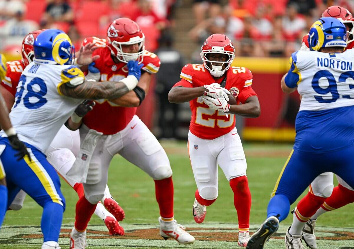 Kansas City Chiefs running back Emari Demercado (25) runs with the ball in the second half of the Kansas City Chiefs vs. Los Angeles Rams preseason game at Arrowhead Stadium in Kansas City on Aug. 15, 2026.