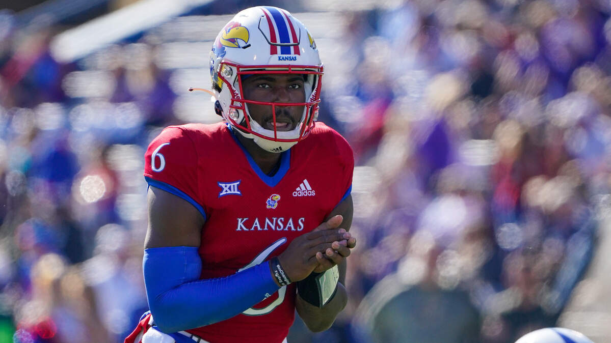 Kansas Jayhawks quarterback Jalon Daniels (6) readies for the snap against the Kansas State Wildcats during the game at David Booth Kansas Memorial Stadium on Nov. 6, 2021.