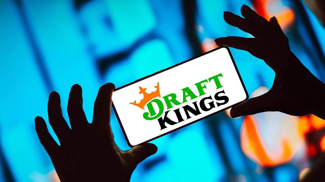 In this photo illustration, the DraftKings Inc. logo is displayed on a smartphone screen. (Photo by Rafael Henrique / SOPA Images/Sipa USA) *** Strictly for editorial news purposes only ***
