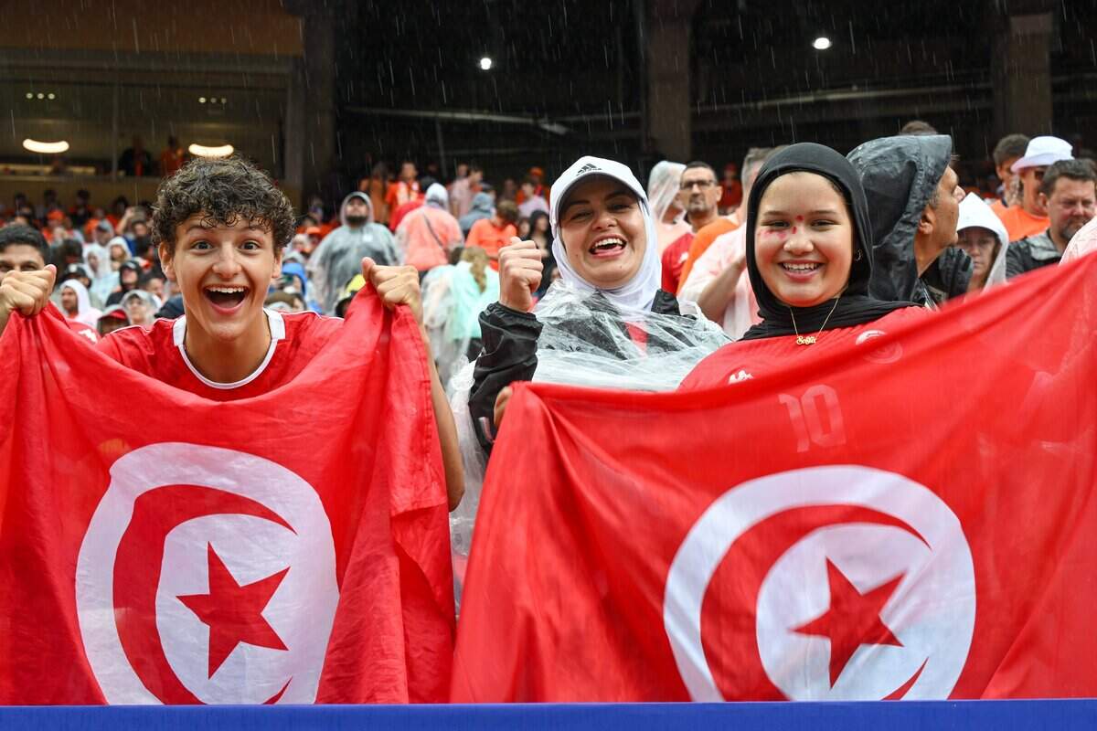 Tunisia fans show their national pride ahead of the Netherlands vs. Tunisia FIFA World Cup group-stage soccer match at Kansas City (Arrowhead) Stadium in Kansas City on Thursday, June 25, 2026.