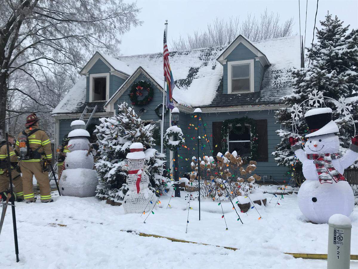 Firefighters responded to a house fire Tuesday morning in the 700 block of North Willie Street in Olathe. A woman was rescued from the house.