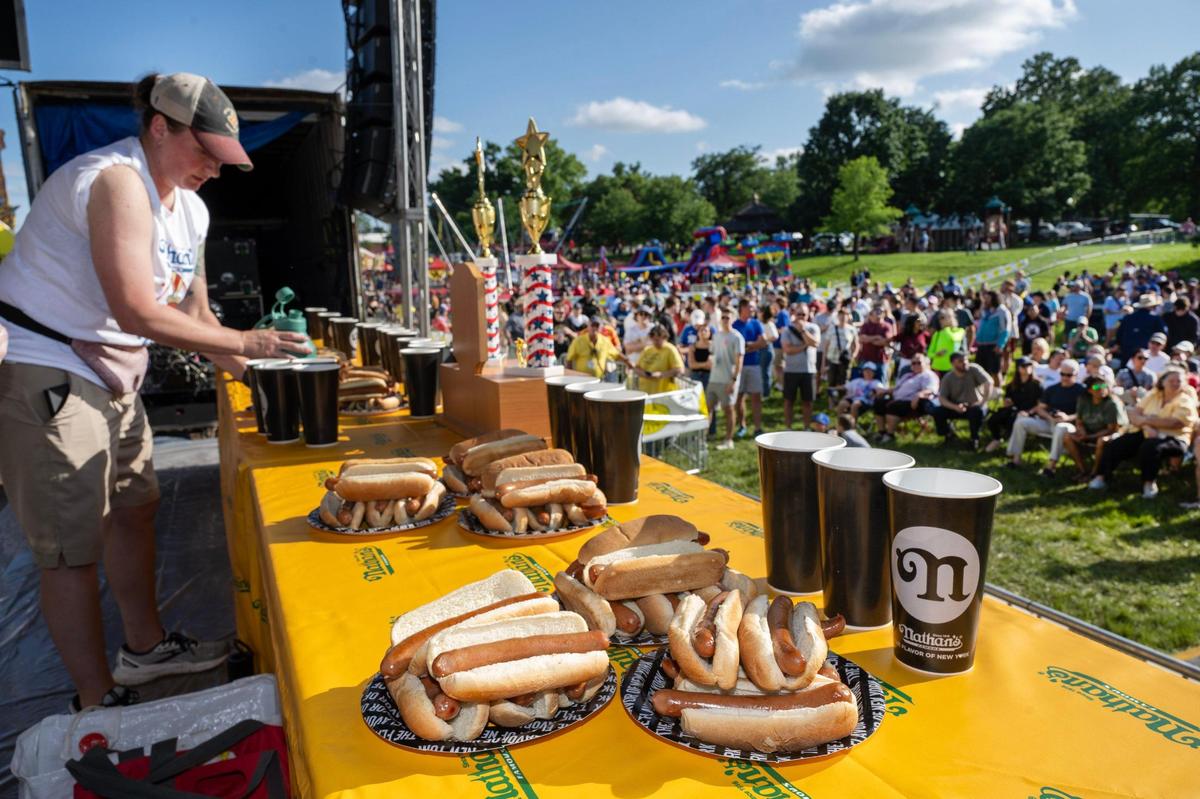 Jocelyn Young of Sherman, Texas, prepares a beverage before Nathan’s Famous Hot Dog Eating Contest.