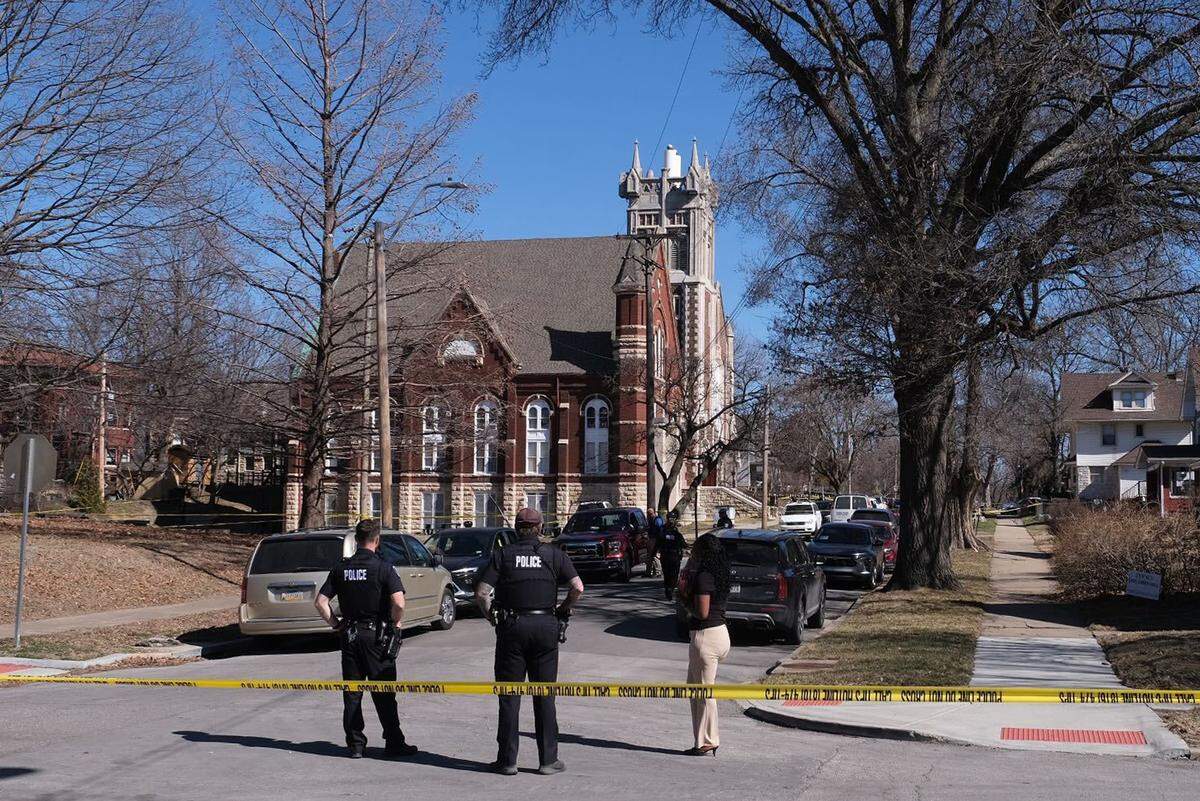 Four people, including a police officer, were injured in a shooting during a funeral service at a church in Kansas City’s Scarritt Renaissance neighborhood Friday morning, police said.