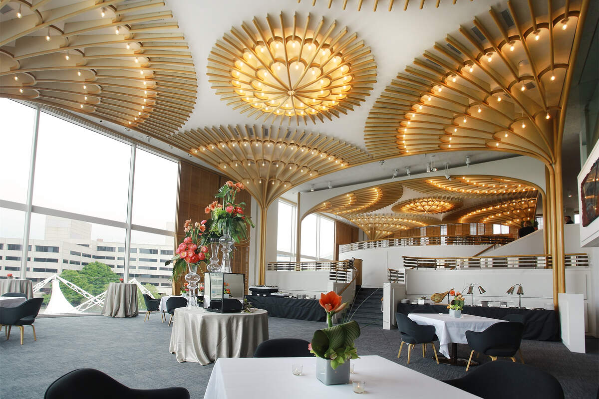 The American Restaurant was named an 2018 Design Icon by the James Beard Foundation. The Kansas City restaurant opened in 1974 and still has many of its original design elements, including the white oak pillars that curve up to the tall ceiling.