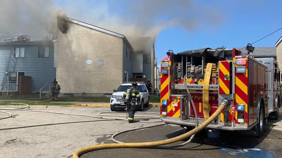 Firefighters contain blaze that started in attic space of Kansas City apartment