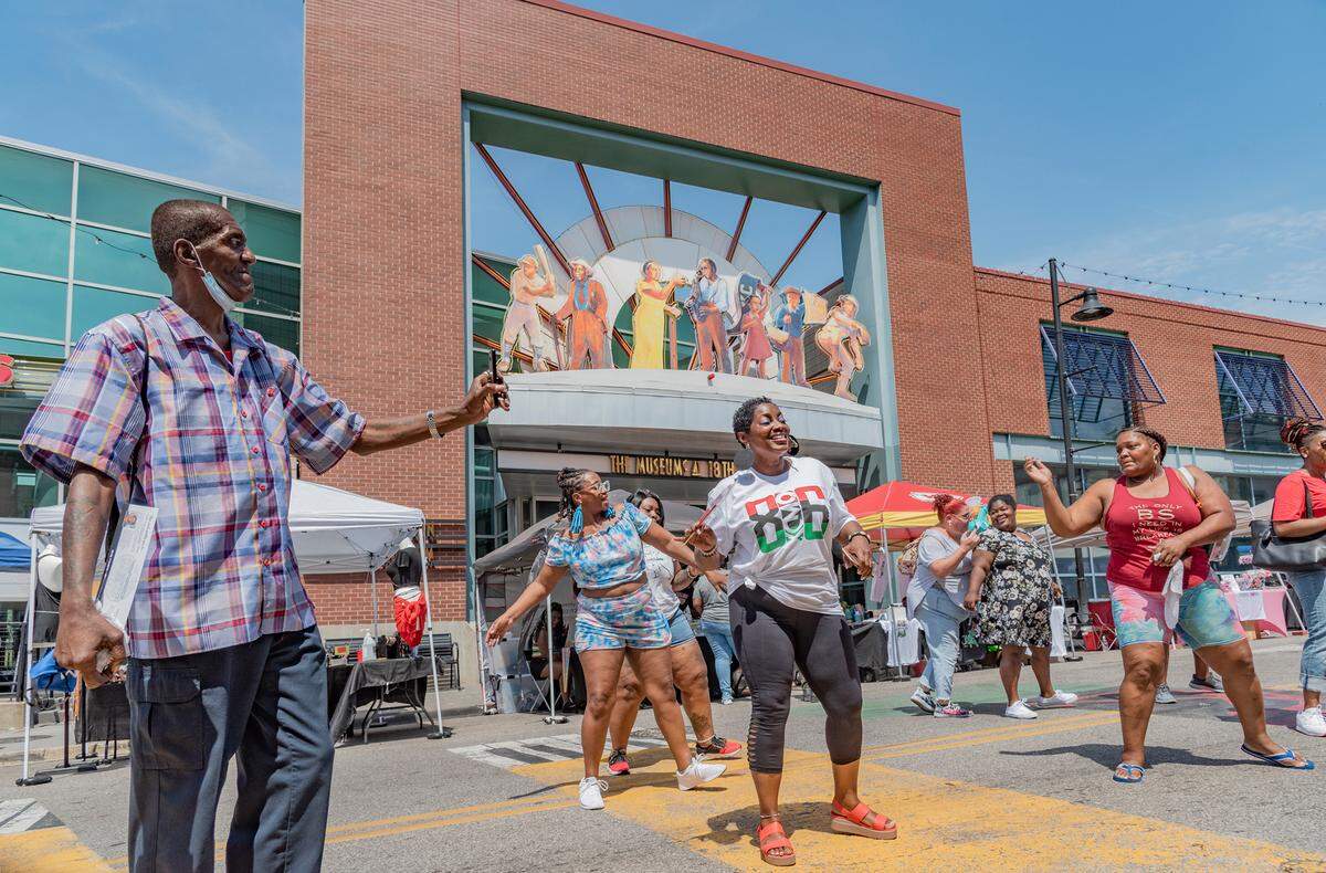 Visitors broke into dance to a DJ’s music at the 816 Day event in the 18th and Vine District.
