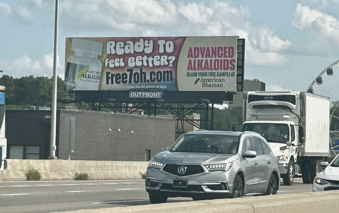 An American Shaman billboard advertising 7-OH on Interstate 35 near Kansas City’s Crossroads.