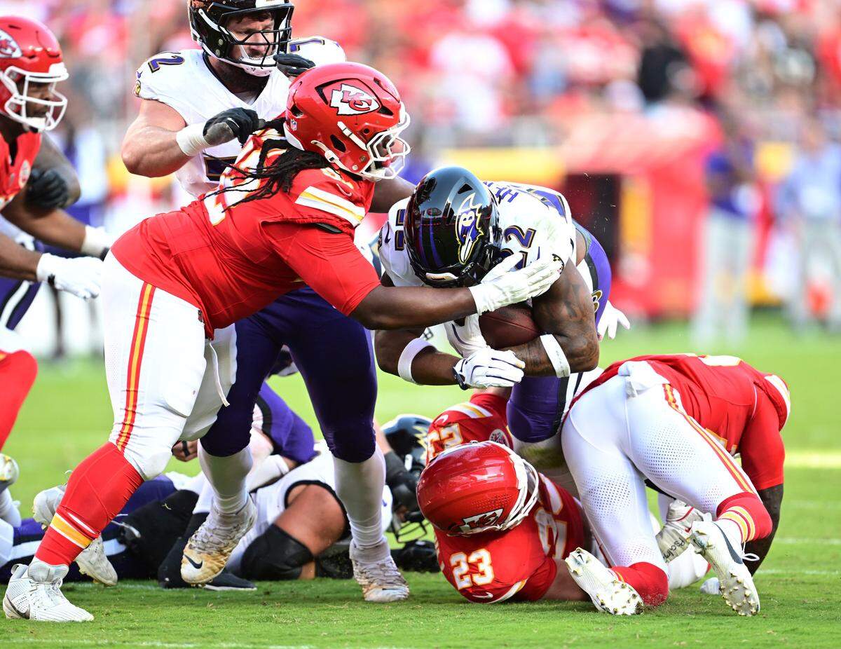 Kansas City Chiefs nose tackle Derrick Nnadi (92) stops Baltimore Ravens running back Derrick Henry (22) on a run in the third quarter on Sunday, Sept. 28, 2025, at GEHA Field at Arrowhead Stadium.