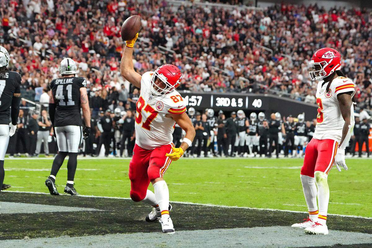 Kansas City Chiefs tight end Travis Kelce spikes the football after catching a touchdown pass from Patrick Mahomes against the Las Vegas Raiders during a Sunday, Oct. 27, 2024 NFL Week 8 game at Allegiant Stadium in Paradise, Nevada.