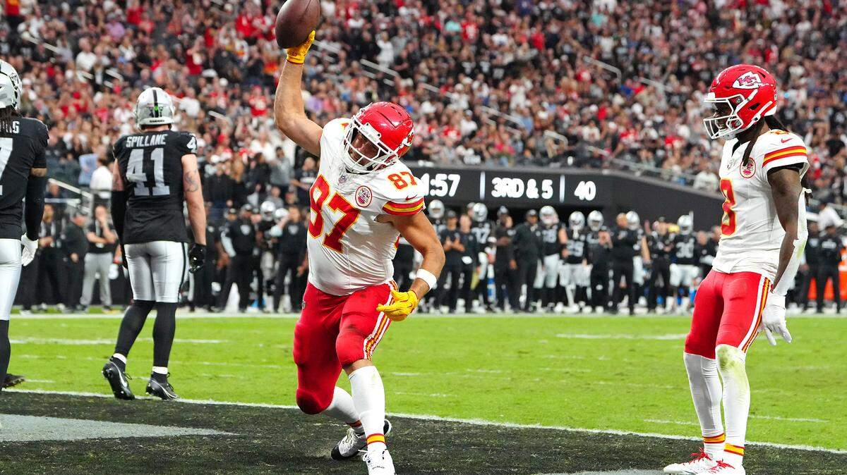 Kansas City Chiefs tight end Travis Kelce spikes the football after catching a touchdown pass from Patrick Mahomes against the Las Vegas Raiders during a Sunday, Oct. 27, 2024 NFL Week 8 game at Allegiant Stadium in Paradise, Nevada.