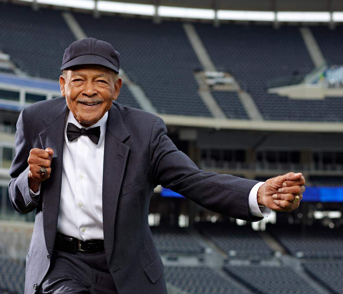 Bob Motley, a Negro League umpire, poses on a baseball field. He was the father of “The League” producer Byron Motley.