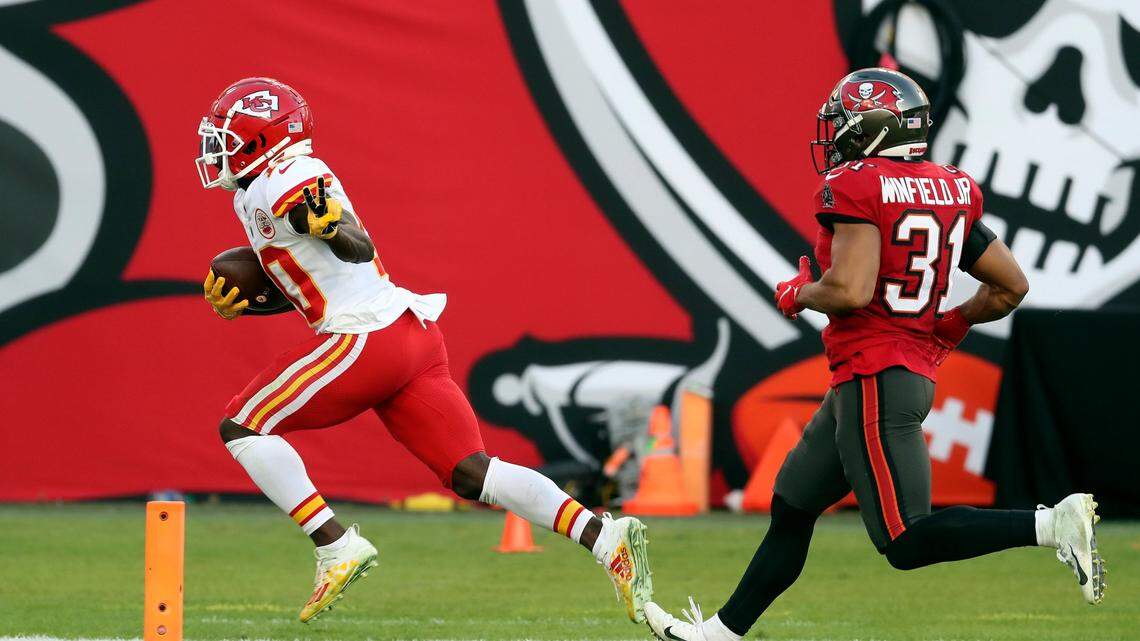 Kansas City Chiefs wide receiver Tyreek Hill beats Tampa Bay Buccaneers safety Antoine Winfield Jr. on a 75-yard touchdown reception during the first half of Sunday’s game.