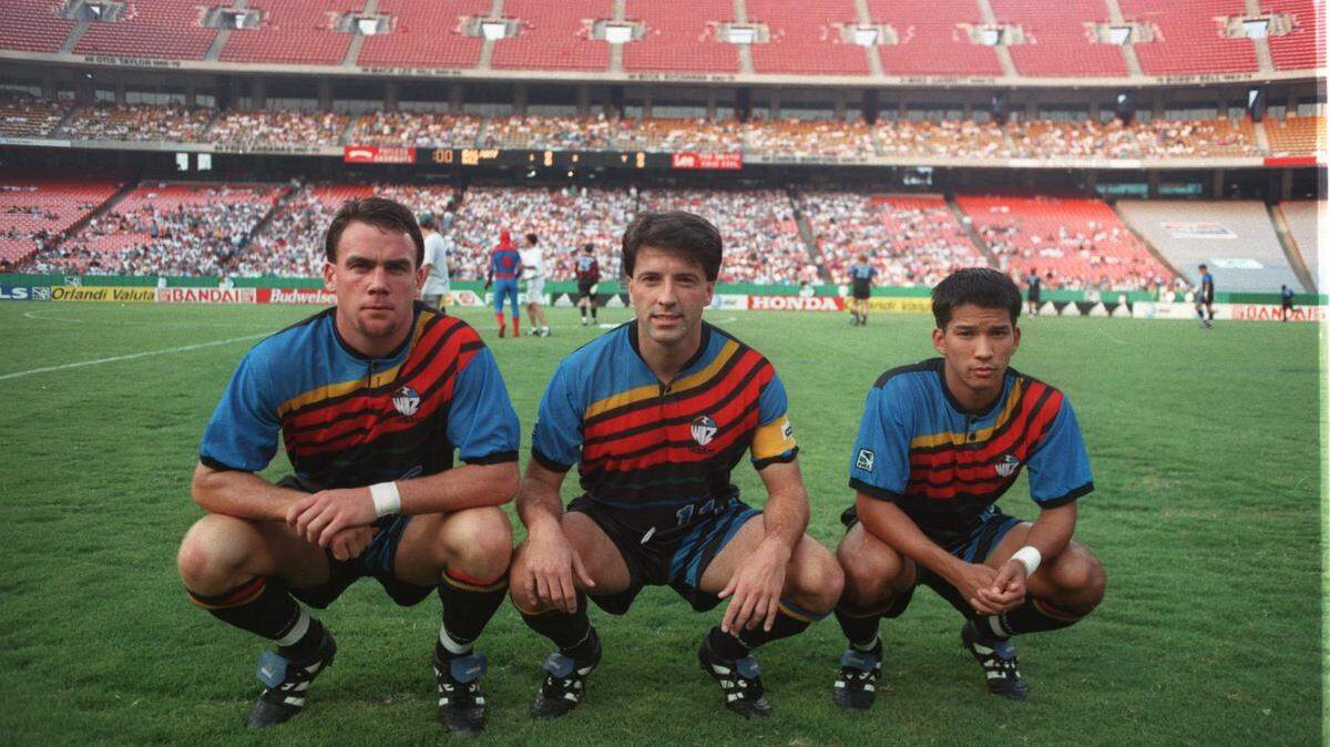 Sean Bowers (from left), Preki and Mark Chung wore the period-fashionable Kansas City Wiz uniforms in 1996, the first year for the team now known as Sporting KC here in Kansas City. Back then, the team played its games at cavernous Arrowhead Stadium.
