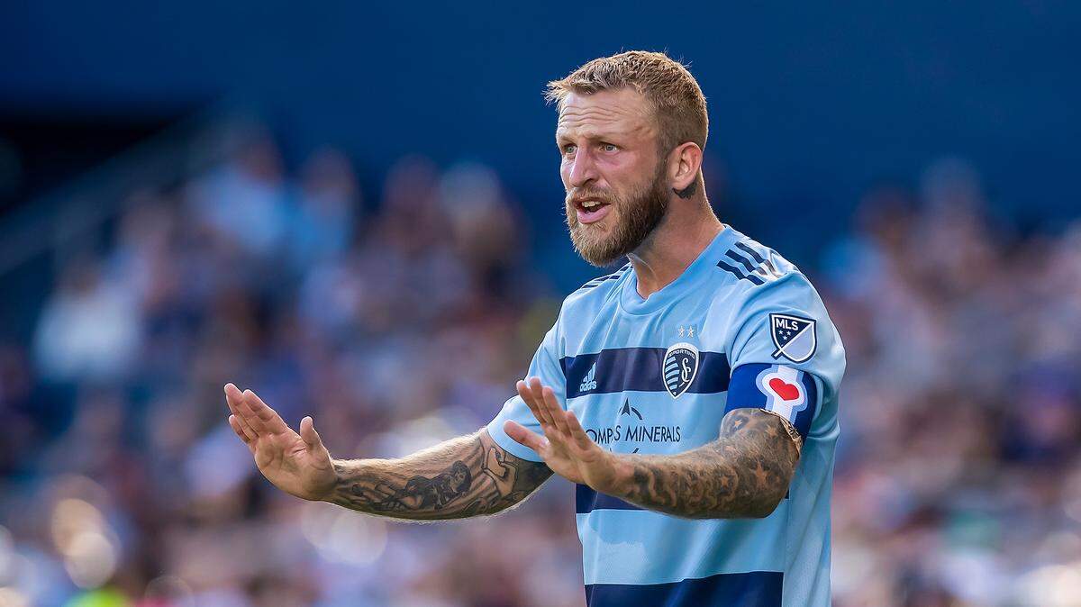 Sporting Kansas City’s Johnny Russell communicates with teammates during an October 2022 match against the Seattle Sounders at Children’s Mercy Park.