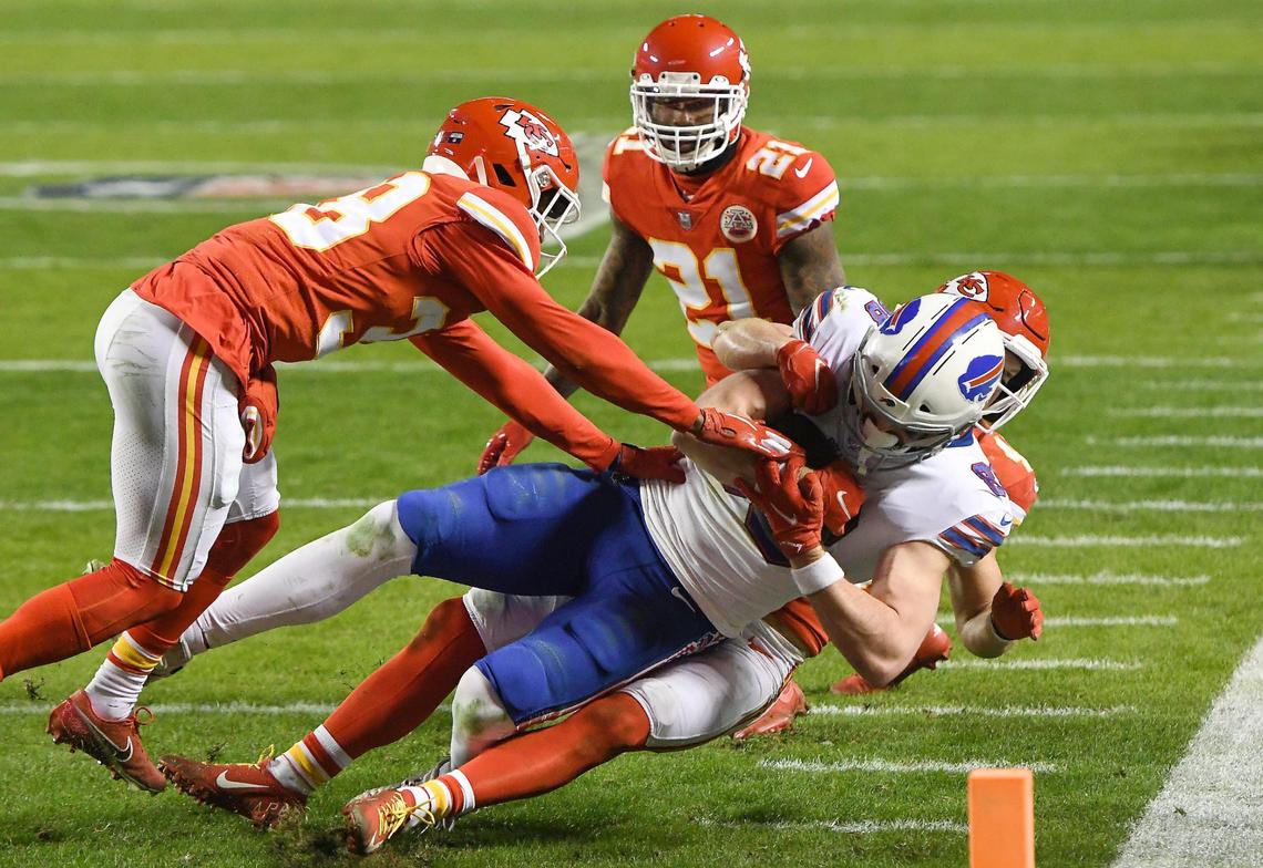 Kansas City Chiefs free safety Daniel Sorensen takes down Buffalo Bills tight end Dawson Knox short of the goal line late in the second quarter with the help of L’Jarius Sneed and Bashaud Breeland Sunday, January 24, 2021, during the AFC Championship Game at Arrowhead Stadium in Kansas City, Missouri.