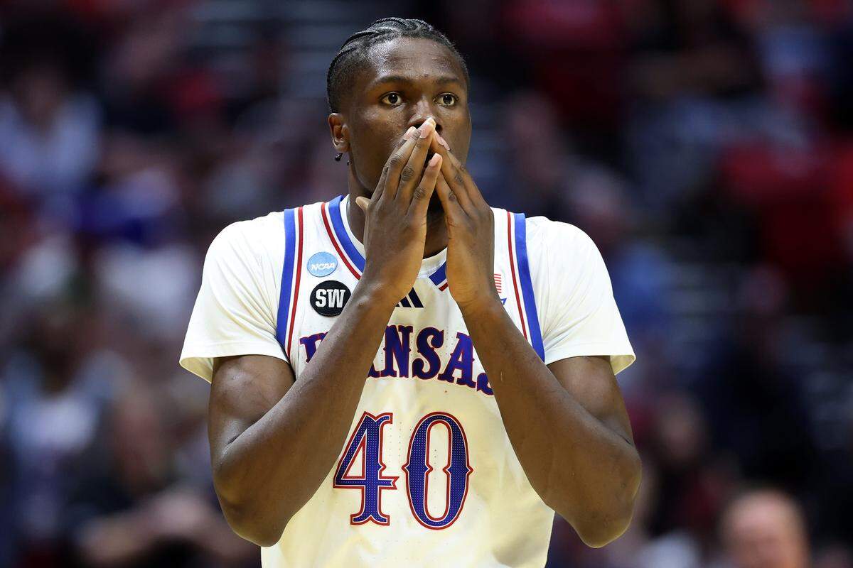 Flory Bidunga #40 of the Kansas Jayhawks reacts during the second half against the St. John's Red Storm in the second round of the 2026 NCAA Men's Basketball Tournament at Viejas Arena on March 22, 2026 in San Diego.