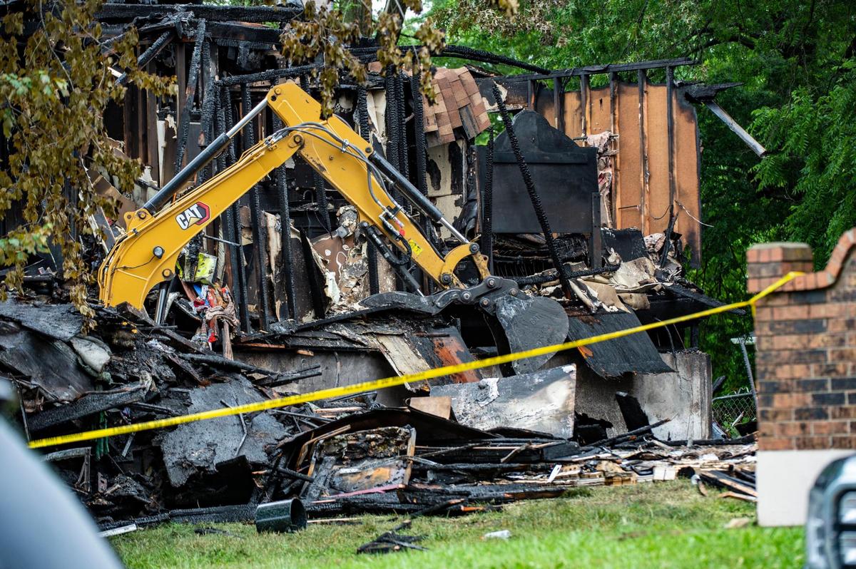 Investigators found a person dead in the basement area of a Raytown home that exploded and caught fire Monday night. The explosion left several people injured at the duplex in the 7500 block of Englewood Avenue. The Bureau of Alcohol, Tobacco, Firearms and Explosives were on the scene Tuesday to investigate the explosion.
