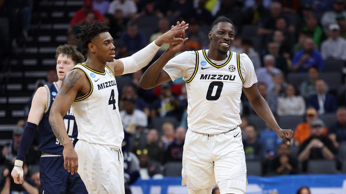 Missouri Tigers guard DeAndre Gholston (4) and forward Mohamed Diarra (0) react against the Utah State Aggies during the first half at Golden 1 Center in Sacramento on March 16, 2023.