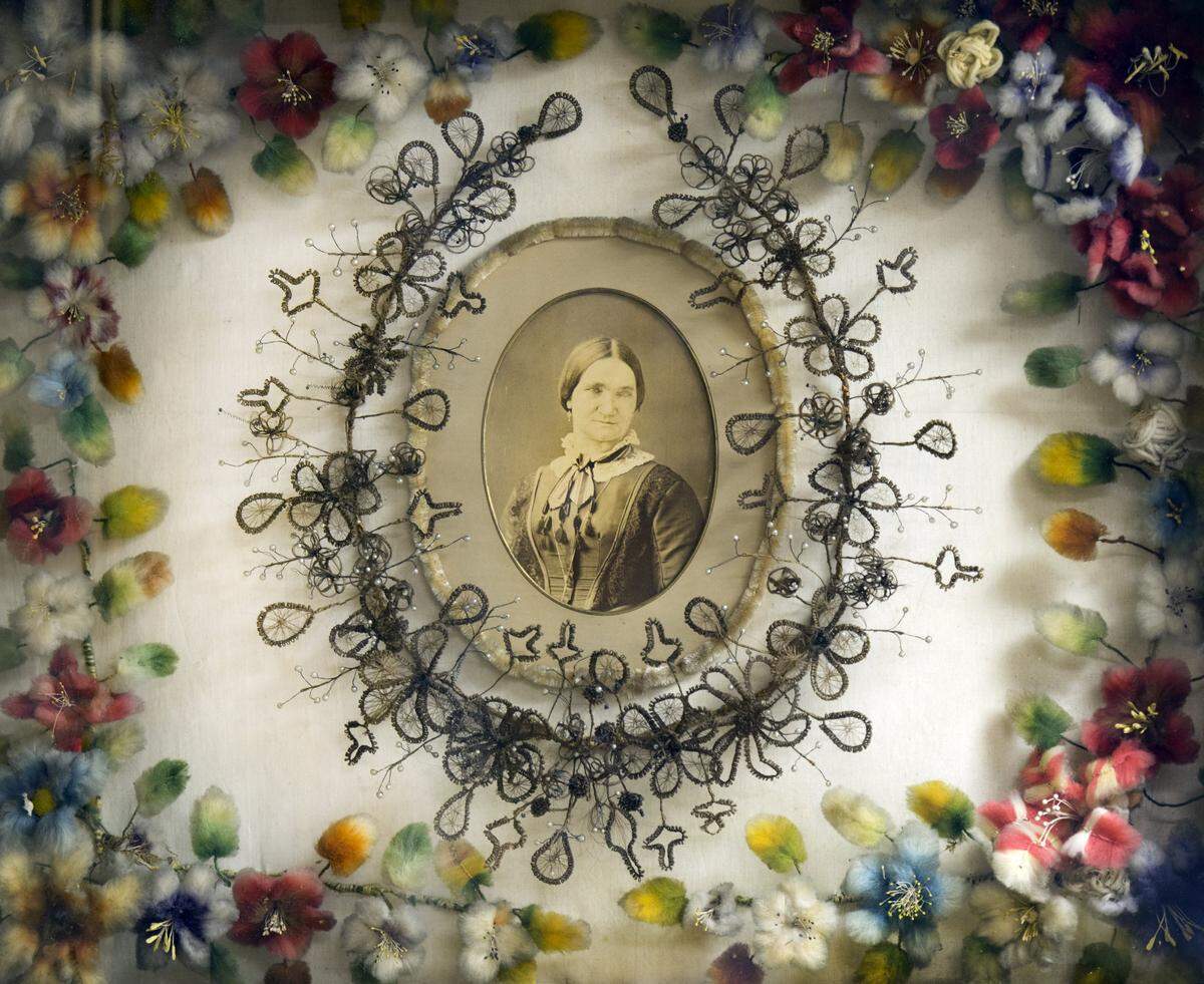 Leila Cohoon operated what was billed as the only hair museum in the world at 1333 S. Noland Road in Independence. This hair wreath on display in 2014 was made by a 9-year-old girl and surrounded by dyed raw cotton.
